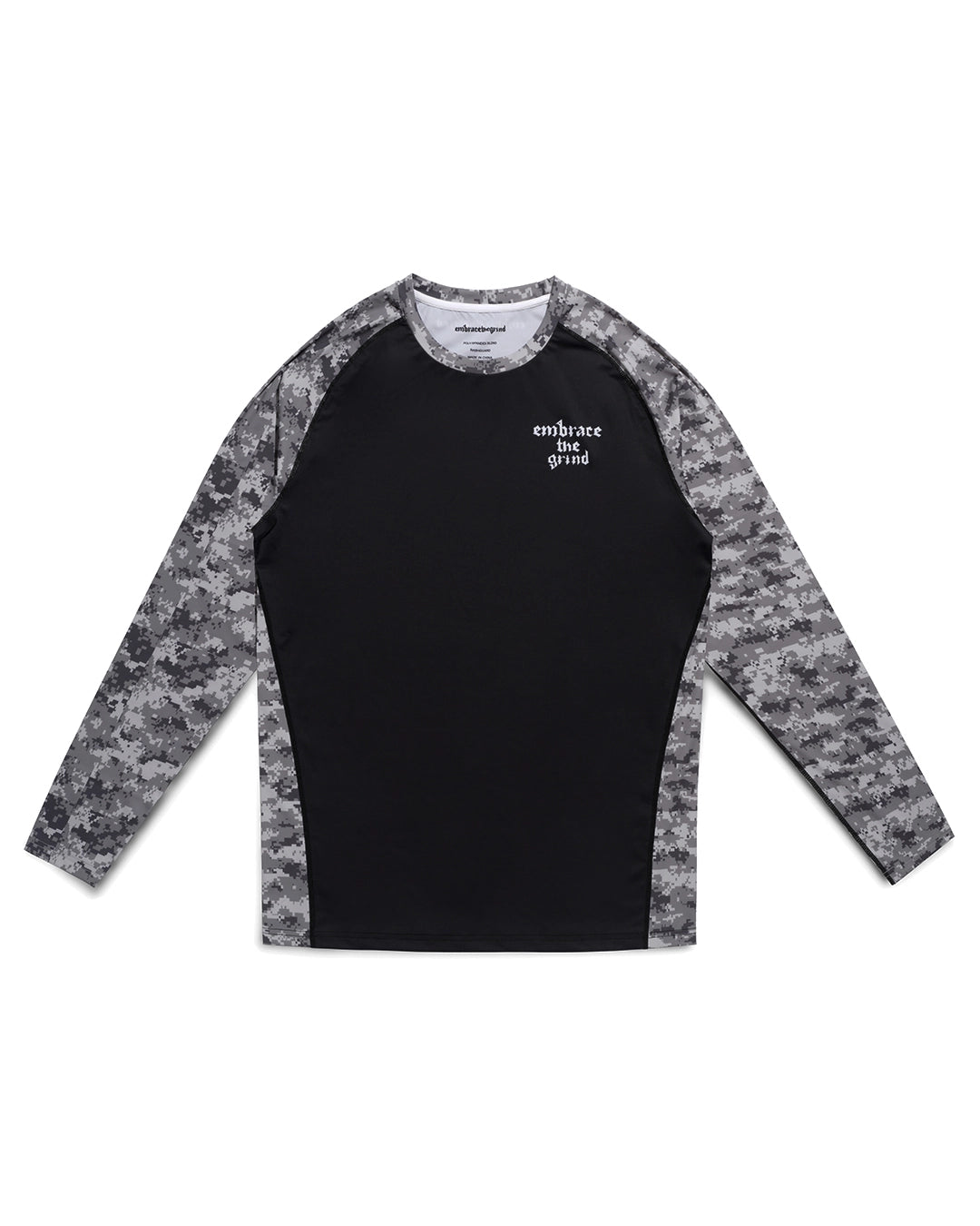 Camo long sleeve rashguard for BJJ and MMA — front flat lay