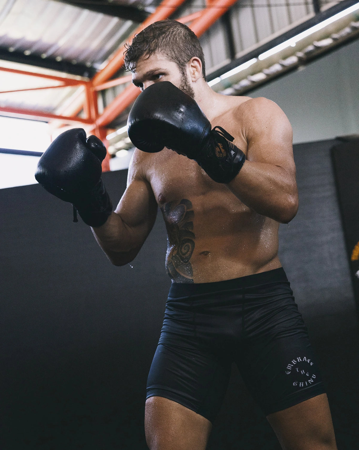 Athlete wearing compression shorts during pad work training