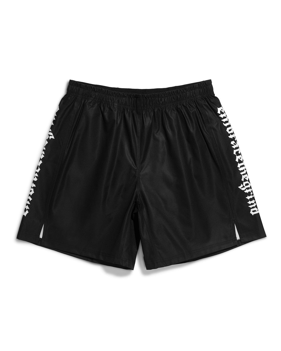 Black MMA training shorts — front flat lay view