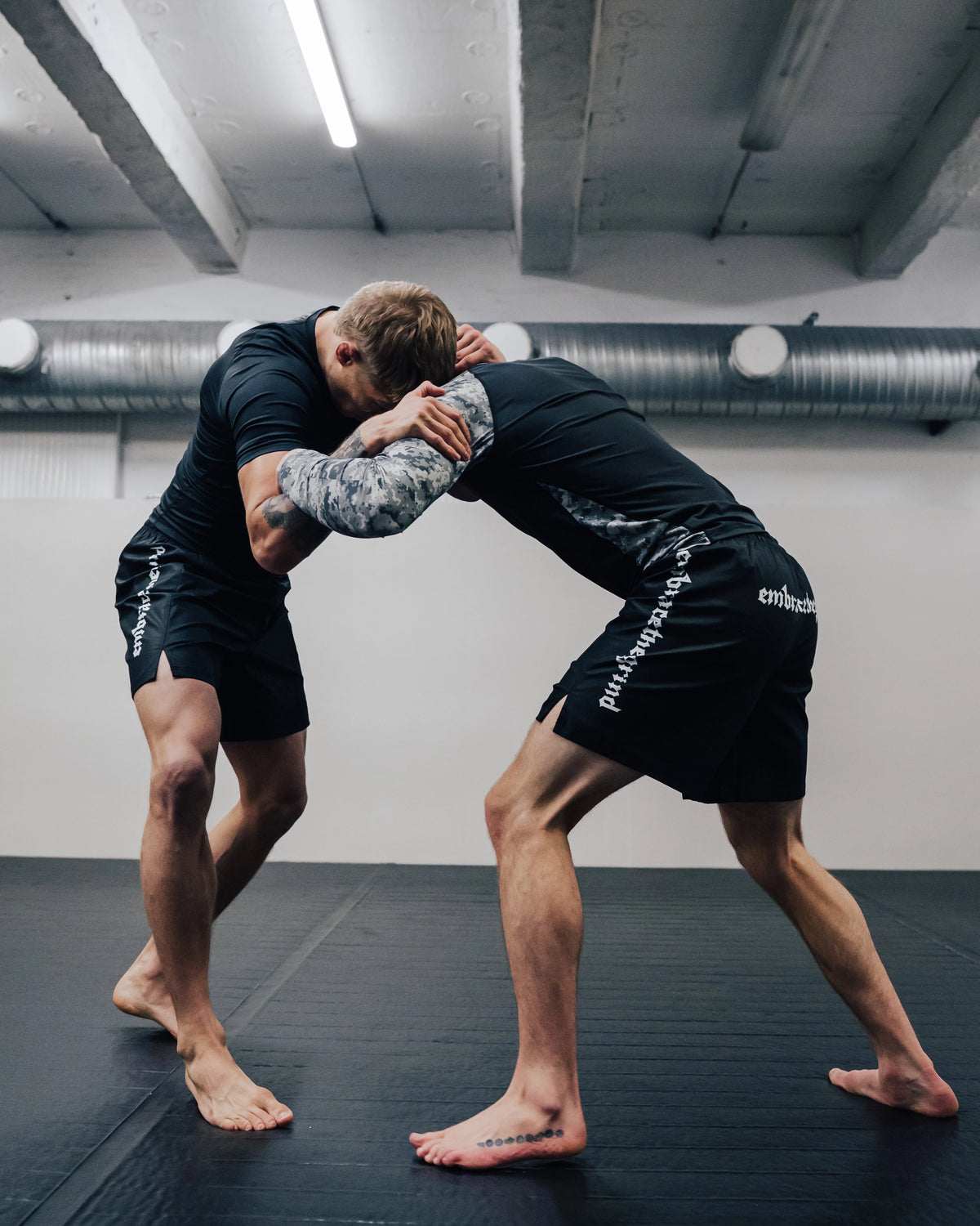 Athlete wearing MMA training shorts during combat sports training