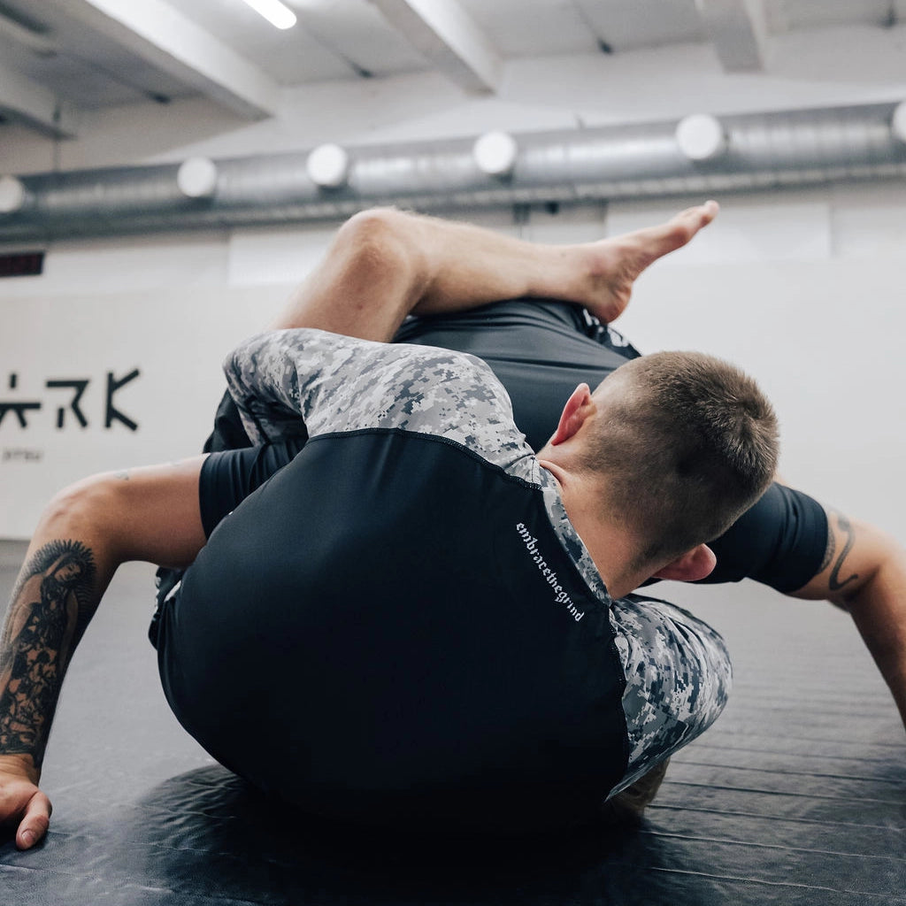 embrace-the-grind-rashguard Image